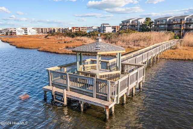 view of dock with a water view