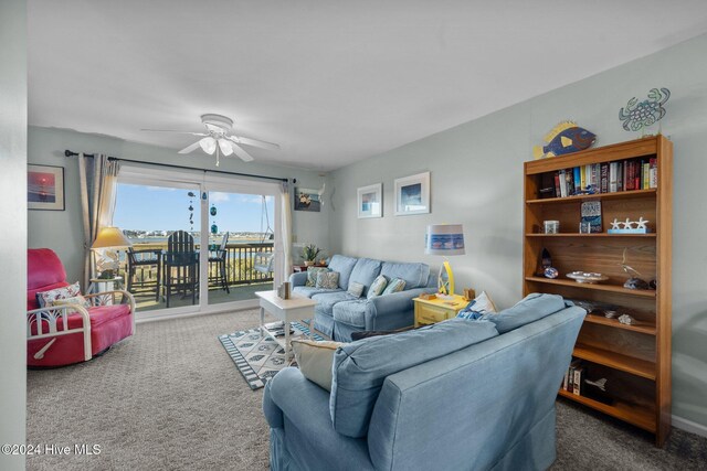 interior space featuring carpet flooring and a water view