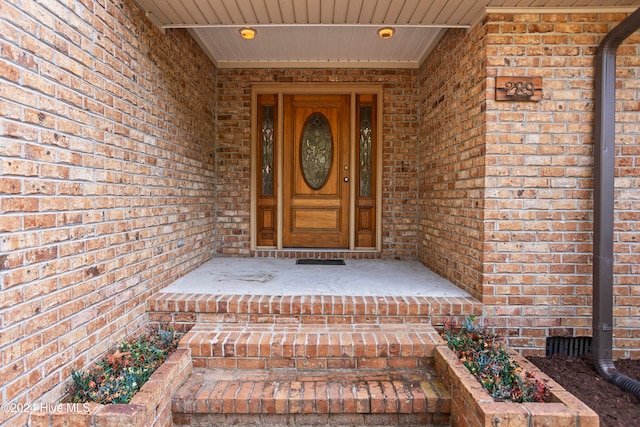 doorway to property with covered porch