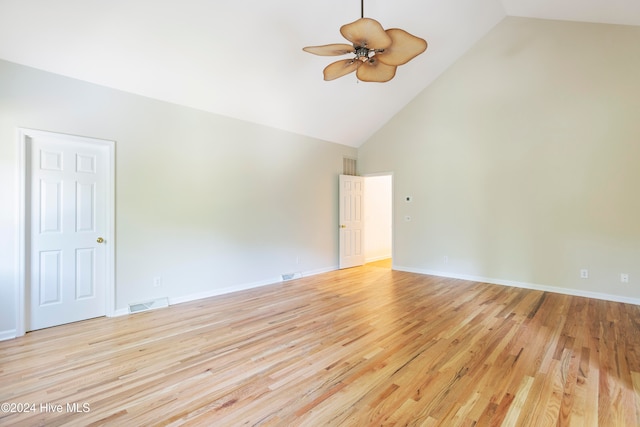 spare room with ceiling fan, light hardwood / wood-style flooring, and high vaulted ceiling