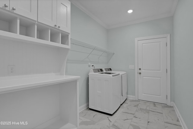 laundry area with baseboards, separate washer and dryer, marble finish floor, and ornamental molding