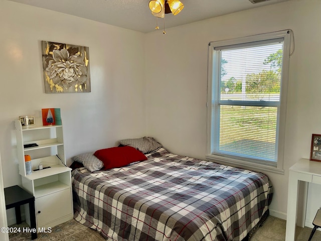 bedroom featuring carpet