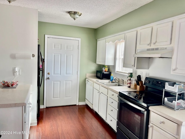 kitchen with white cabinetry, sink, black appliances, and dark hardwood / wood-style floors