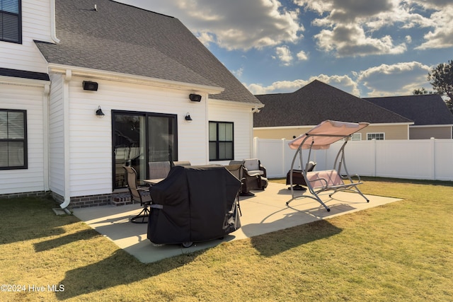 exterior space featuring a yard and a patio area