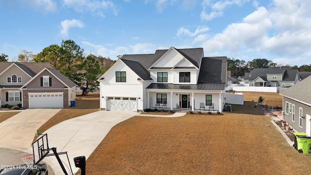 view of front facade featuring a garage, covered porch, and cooling unit