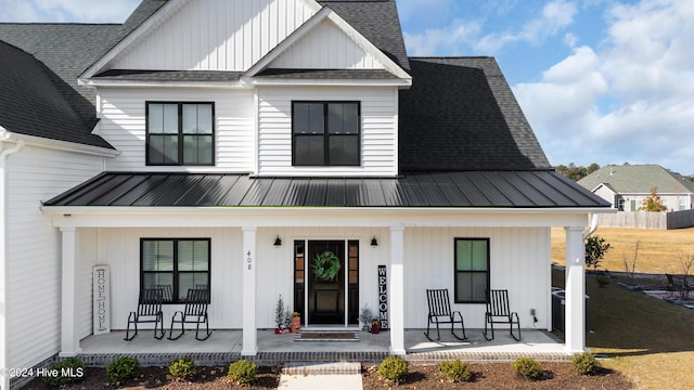 modern inspired farmhouse with covered porch