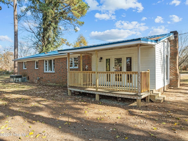 view of front of house featuring cooling unit