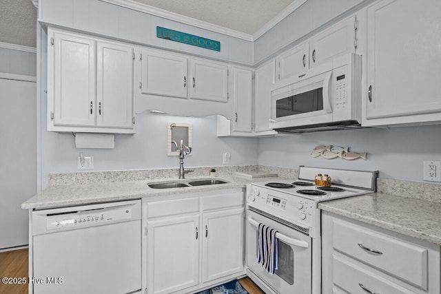 kitchen with sink, crown molding, white appliances, a textured ceiling, and white cabinets