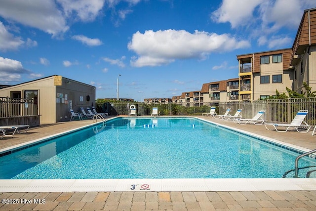 view of pool featuring a patio area