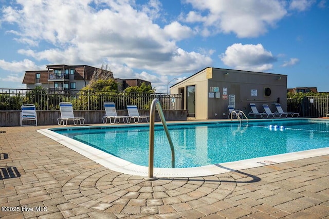 view of swimming pool featuring a patio