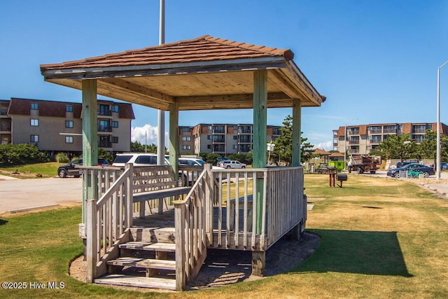 deck featuring a lawn