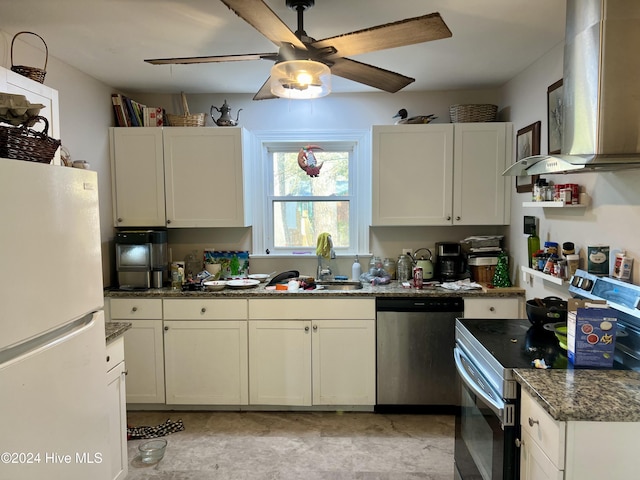 kitchen featuring ventilation hood, stainless steel appliances, ceiling fan, sink, and white cabinets