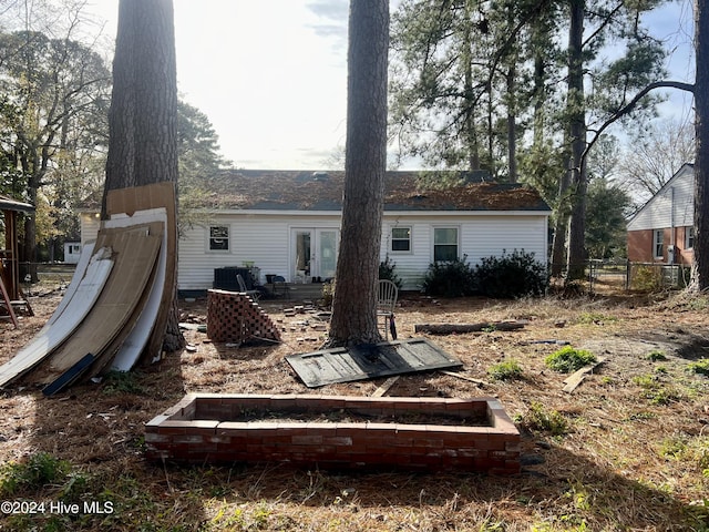 back of property with french doors