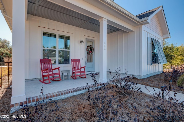 doorway to property with a porch