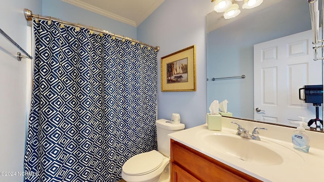 bathroom featuring vanity, toilet, and crown molding