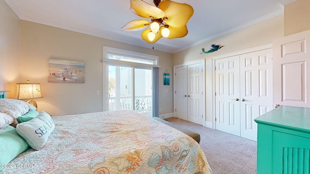 bedroom with crown molding, carpet flooring, ceiling fan, access to exterior, and multiple closets