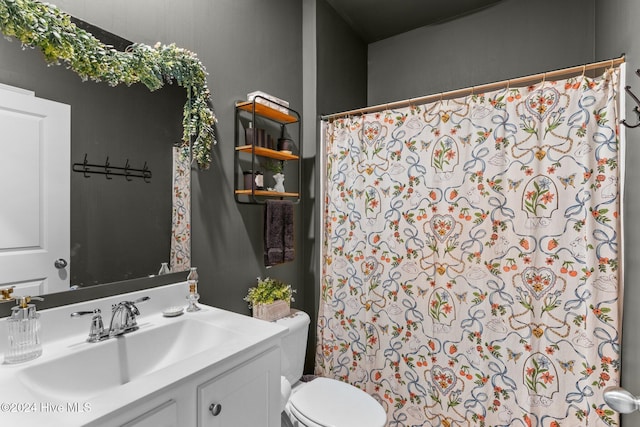 full bathroom with toilet, a shower with shower curtain, and vanity