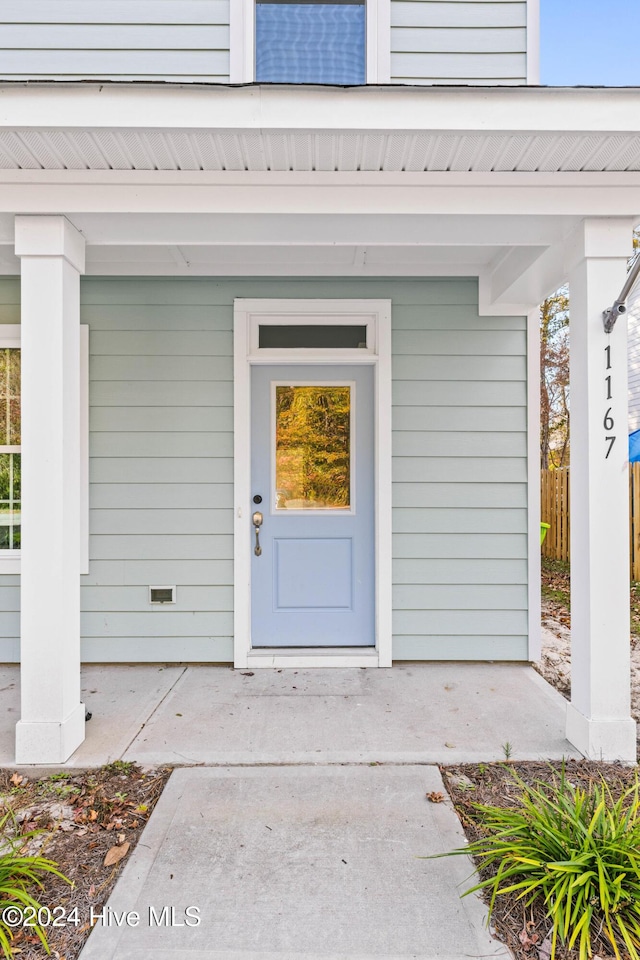 view of front of property featuring a garage and a front yard