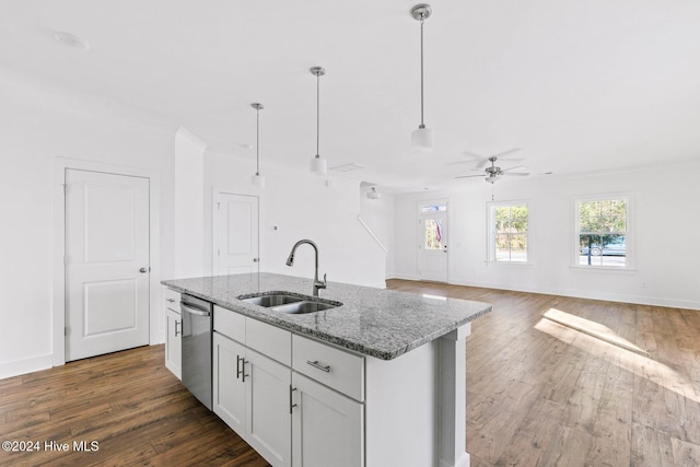 unfurnished living room with hardwood / wood-style flooring, ceiling fan, and sink