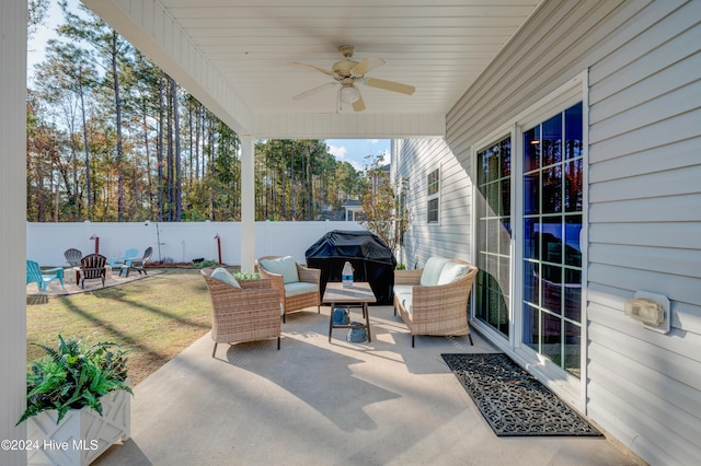 view of patio featuring area for grilling and ceiling fan