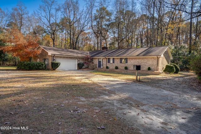 ranch-style home with a garage