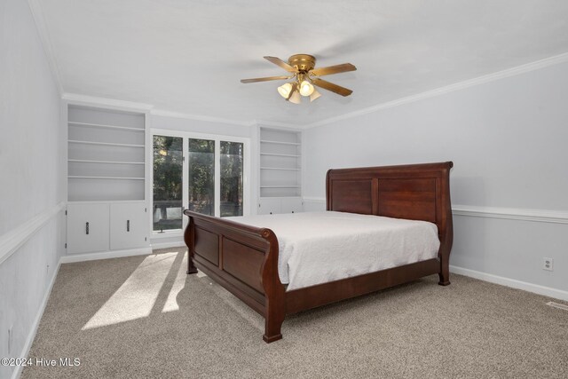 carpeted bedroom featuring ceiling fan, ornamental molding, and access to outside