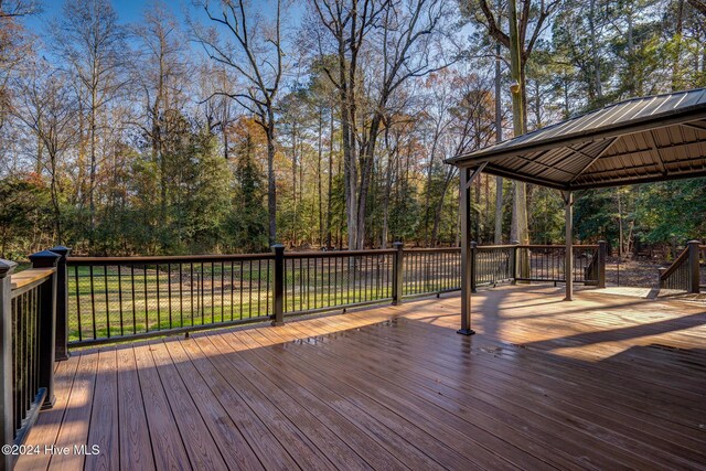 wooden deck with a gazebo