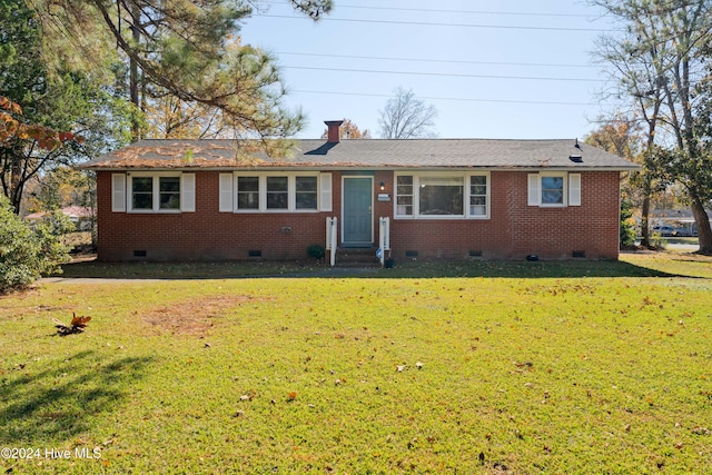 single story home featuring a front yard