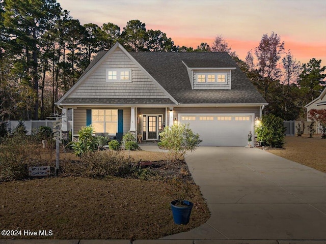 view of front of home featuring a garage