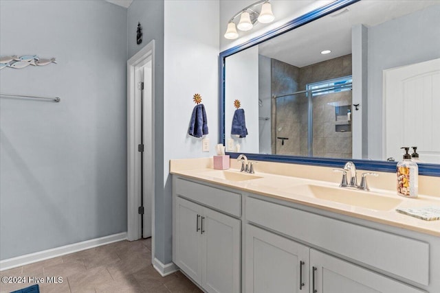 bathroom with vanity and an enclosed shower