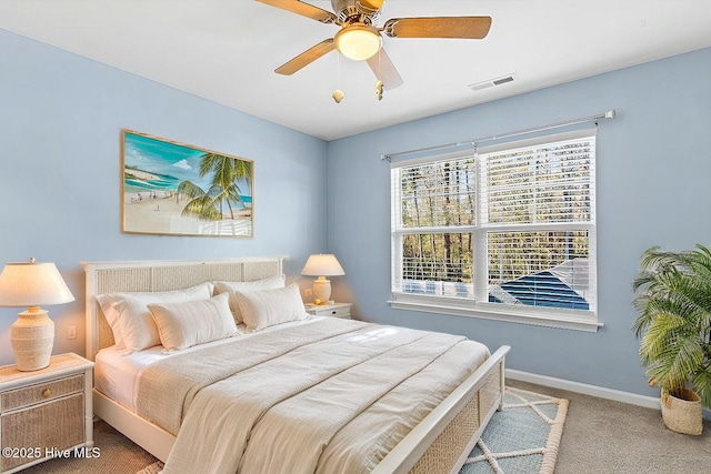 bedroom with ceiling fan and carpet floors