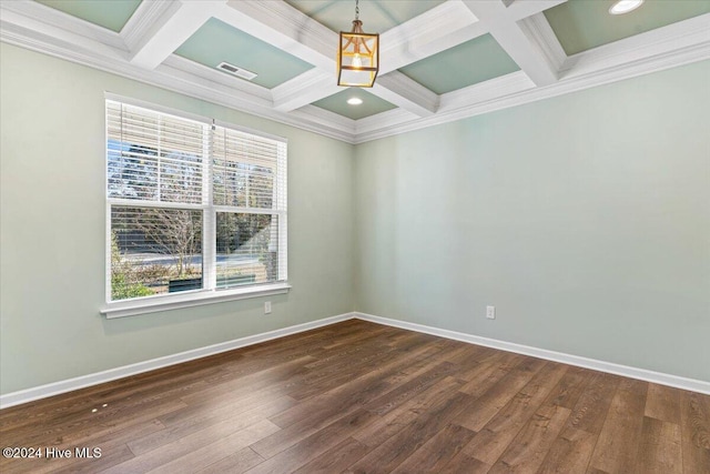 empty room with crown molding, coffered ceiling, dark wood-type flooring, and beam ceiling