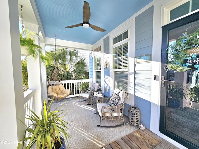 exterior space featuring a wealth of natural light and ceiling fan