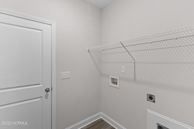 laundry room featuring hookup for an electric dryer, washer hookup, and hardwood / wood-style floors