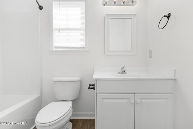 full bathroom featuring shower / bathtub combination, vanity, toilet, and hardwood / wood-style floors