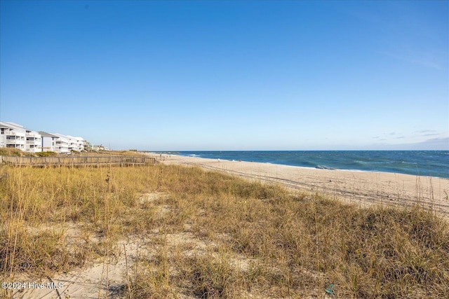 property view of water featuring a beach view