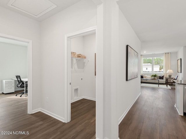 hallway featuring dark hardwood / wood-style floors