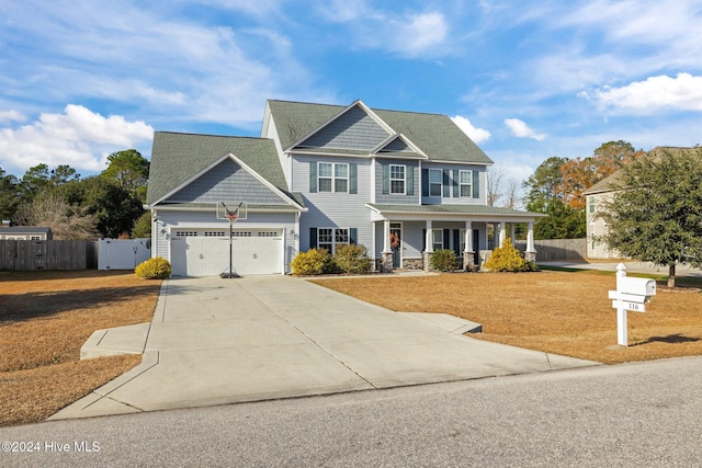 view of front of home with covered porch and a front lawn