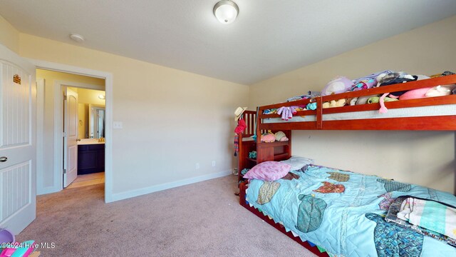 bedroom featuring baseboards, visible vents, and carpet floors