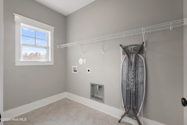 laundry area with hookup for an electric dryer and washer hookup