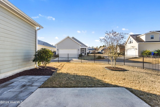 view of yard featuring a garage