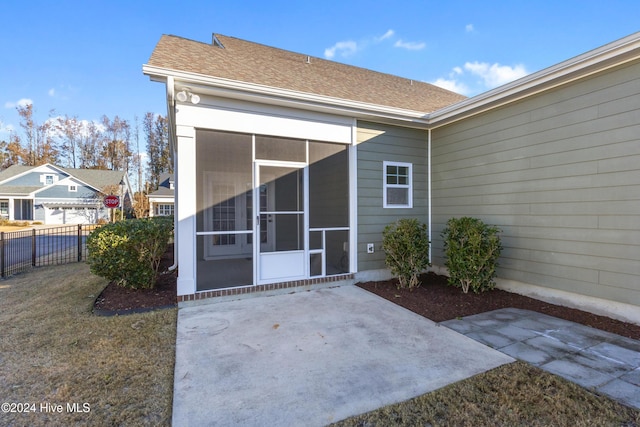 property entrance with a patio area