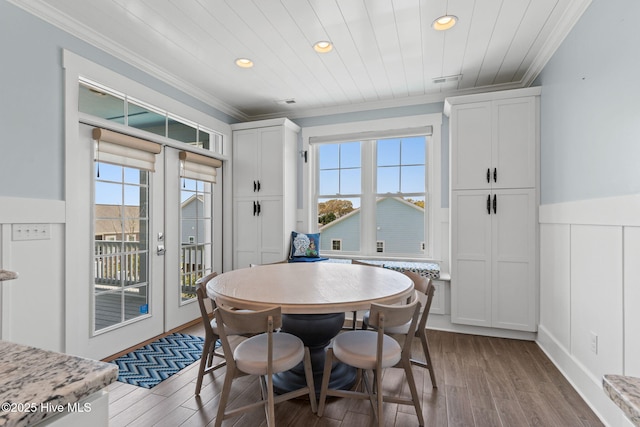 dining area with recessed lighting and ornamental molding