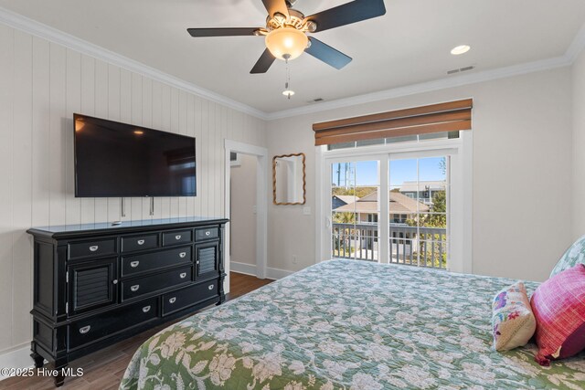 bedroom featuring dark wood-style floors, access to outside, crown molding, visible vents, and baseboards