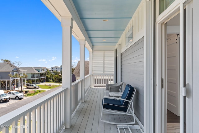 balcony featuring a residential view