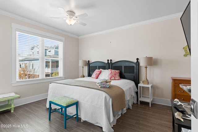 bedroom with wood finished floors, crown molding, a ceiling fan, and baseboards