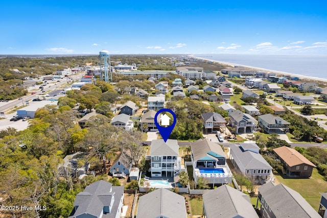 aerial view featuring a residential view and a water view