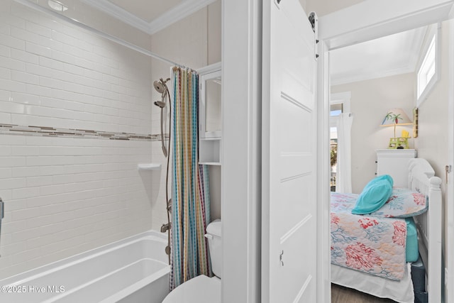 bathroom featuring shower / tub combo, toilet, and ornamental molding
