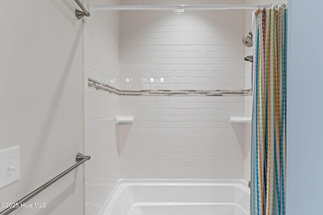 bathroom with a shower with shower curtain