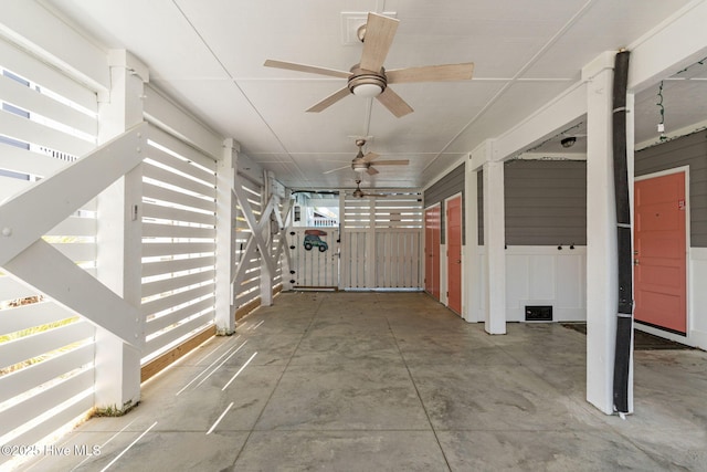 exterior space featuring ceiling fan